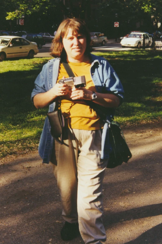 a woman standing outside on the street