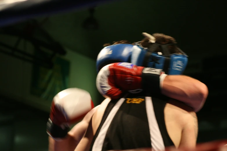 two boxers stand ready to hit their opponents face