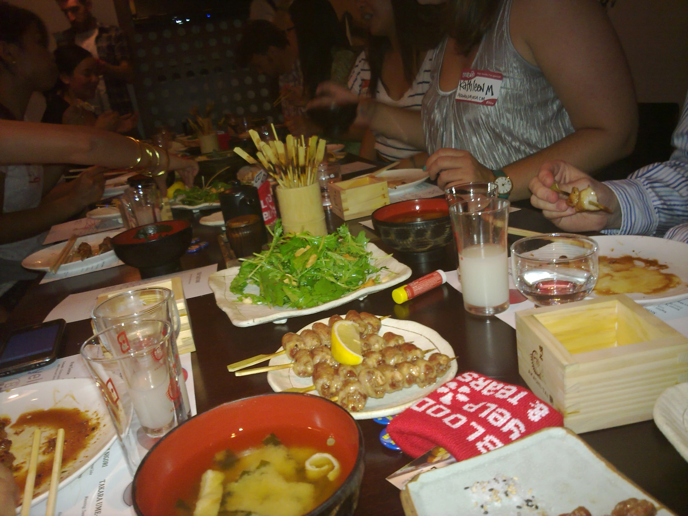 a long table filled with dishes of food