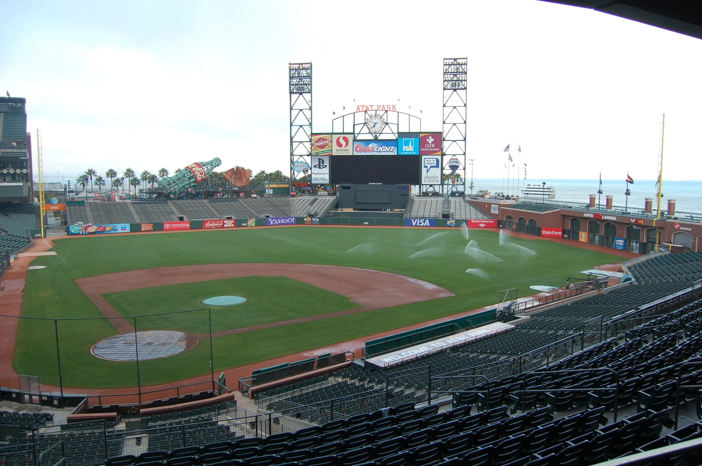 the stadium has an empty baseball field at it's home plate