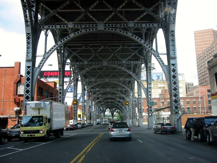 a highway has a road going under the bridge