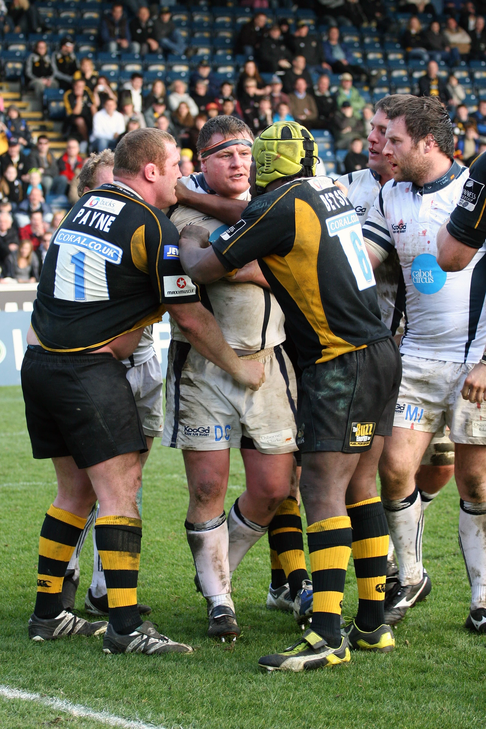 rugby players huddled in a huddle during a game