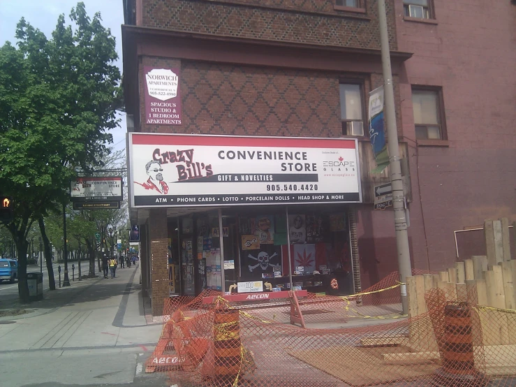 the front of a store that has been covered by construction
