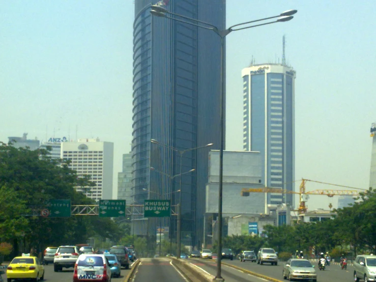 a traffic light is in front of some buildings