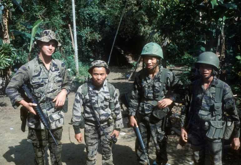 a group of people with some very large guns