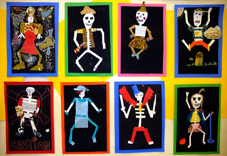 the skeleton paper cutouts are all different colors