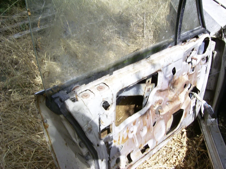 the front door panel of an old vehicle