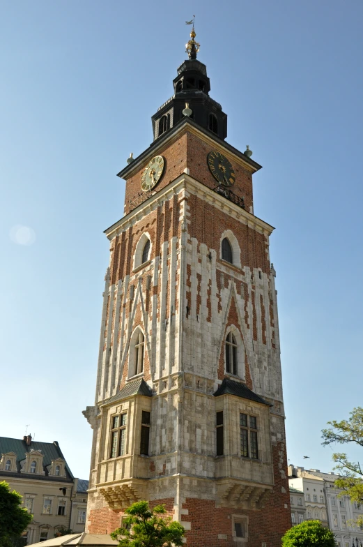 a tower with a clock on top in the day time
