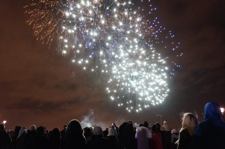 a big firework show that people are watching it