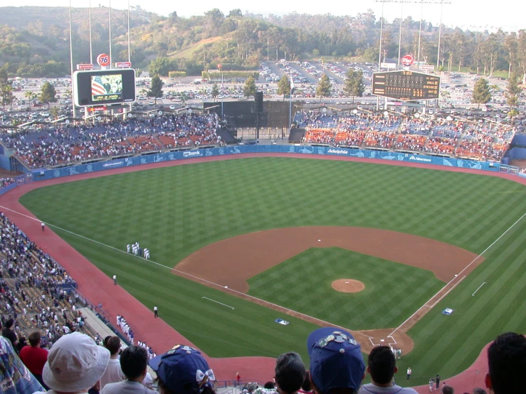 a baseball stadium filled with lots of people