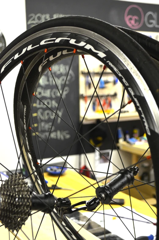 a wheel and bike tire are on display