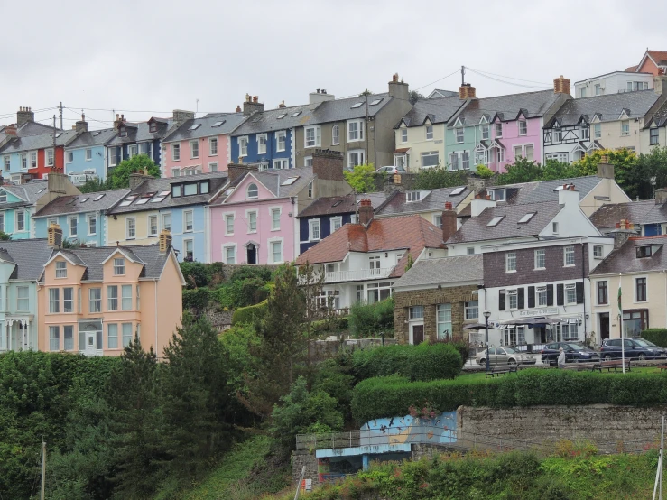 a hillside with many colorful buildings on it