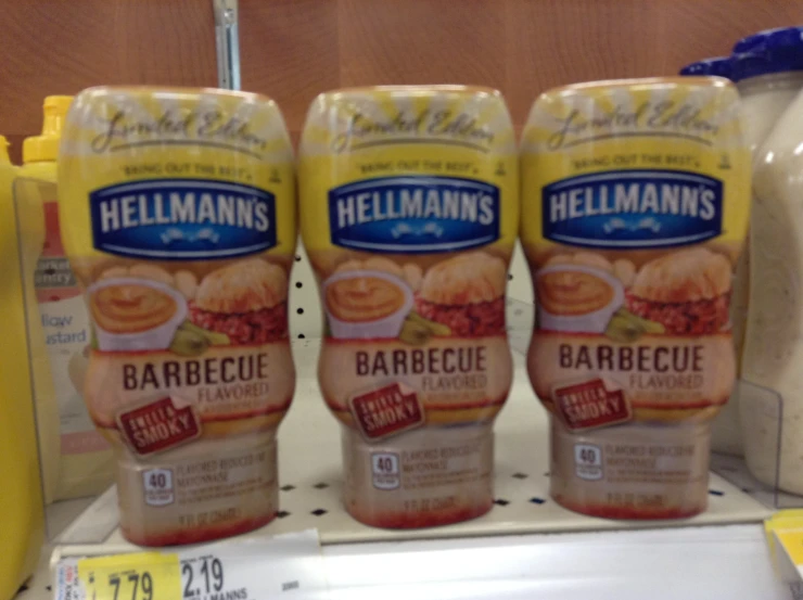 3 campbells hellanne's barbecue sauce sitting on a shelf