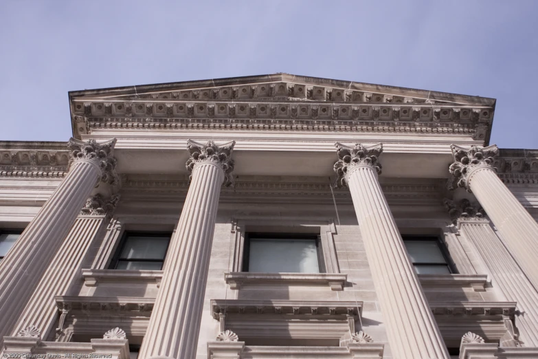 tall white pillars on the front of a building