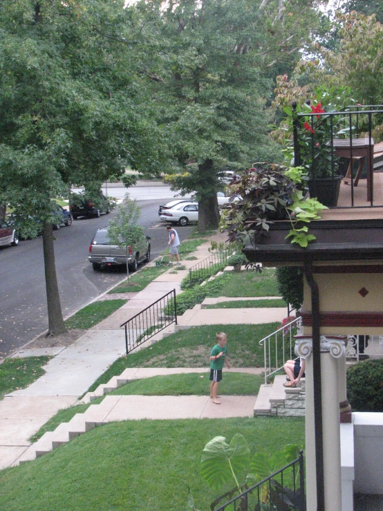 two people are walking down a set of steps