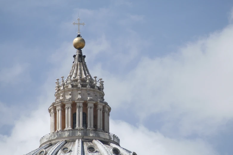 a tower with a gold ball on top