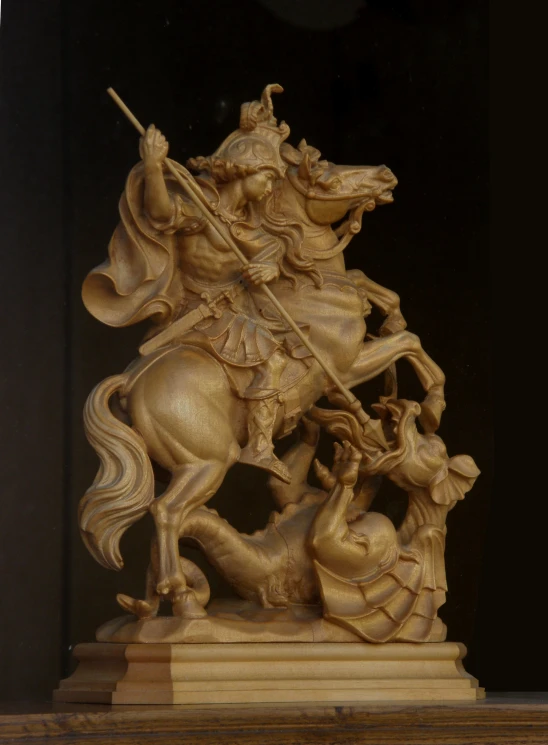 a sculpture of a man on horseback with a sword