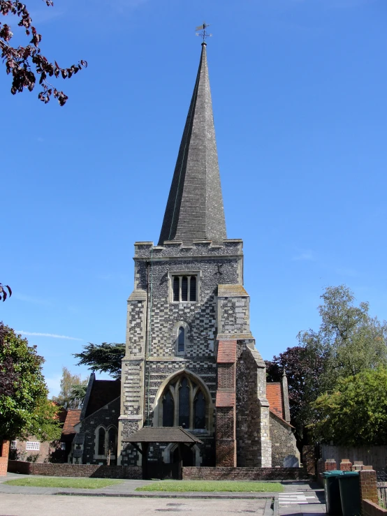 an old church with a steeple is pictured