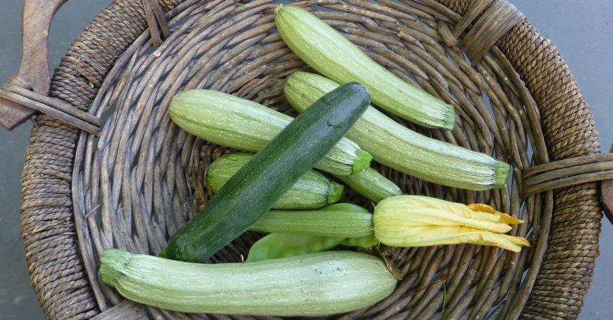 an image of vegetables that are inside a wicker basket