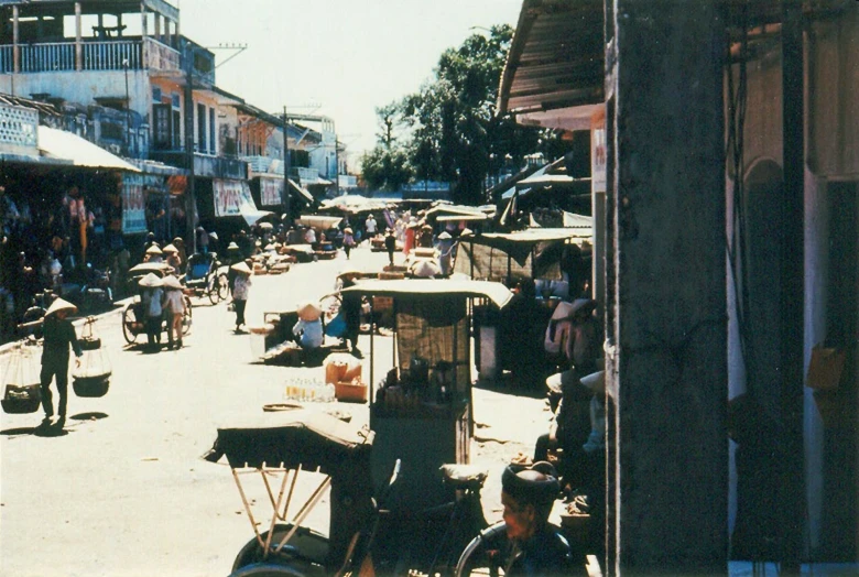 the street is full of people and people shopping