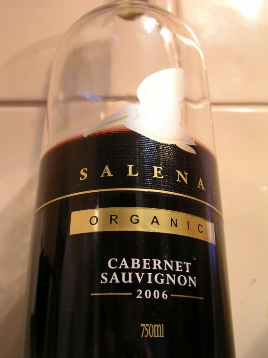 a bottle of wine in a glass container