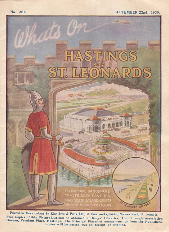 an old magazine cover of a man standing next to a model town