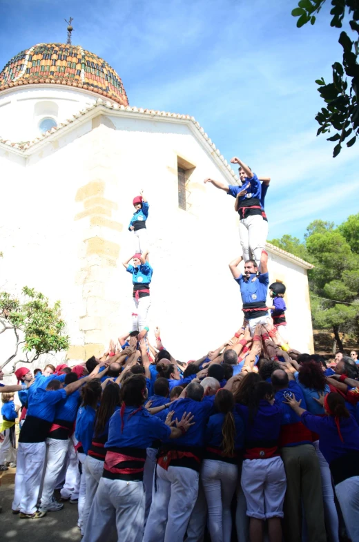 people are doing tricks with some hands in the air