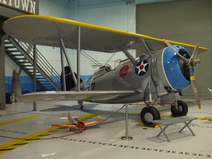 an old plane is on display in the museum