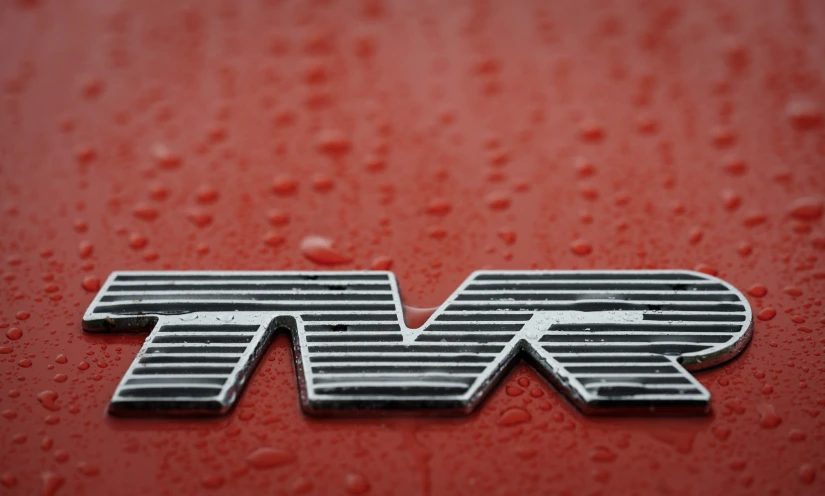 the letters m and f are on a red car