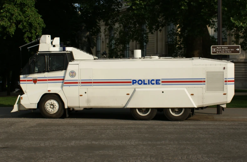 the police vehicle has a special front bumper on it