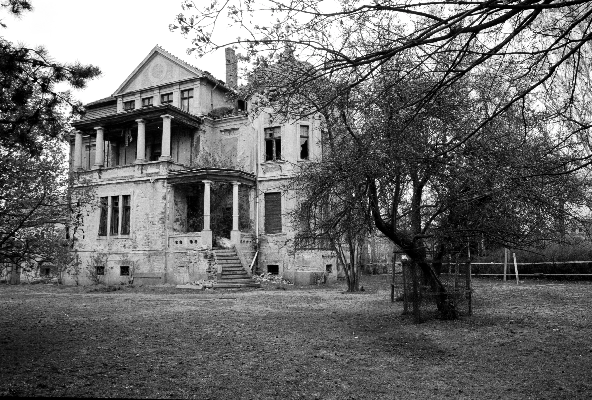 a black and white po of an old house