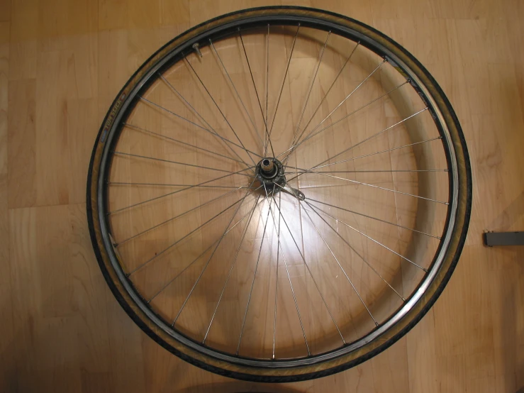 an upside down view of a bicycle tire