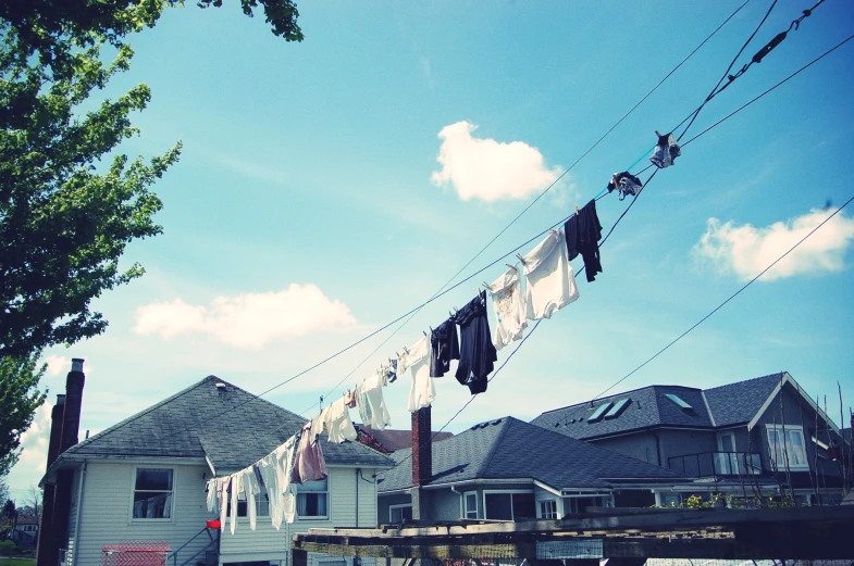 clothes on the line in front of houses in an area