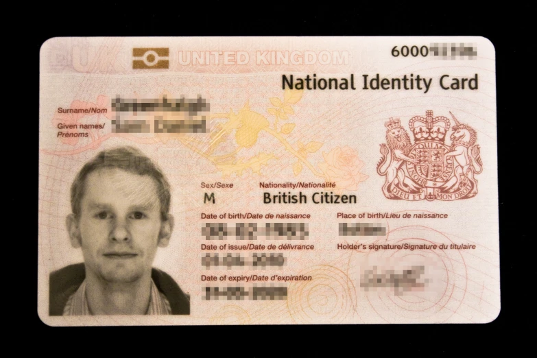 a british identity card with a child's face