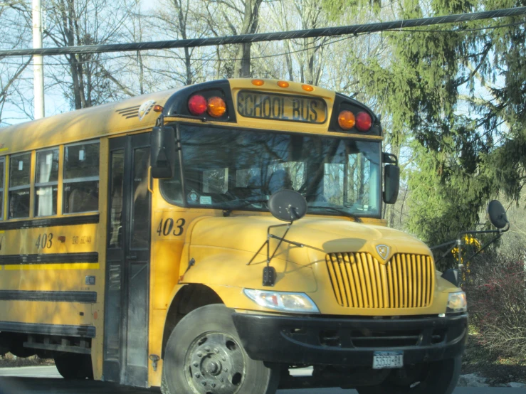 a close up of a school bus parked at the curb