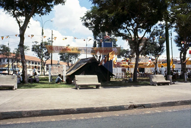 benches lined up in front of some buildings