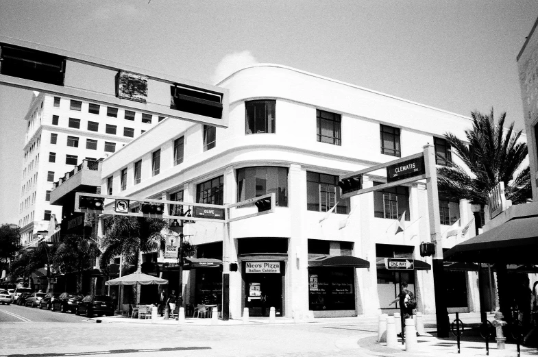 a black and white picture of a city street