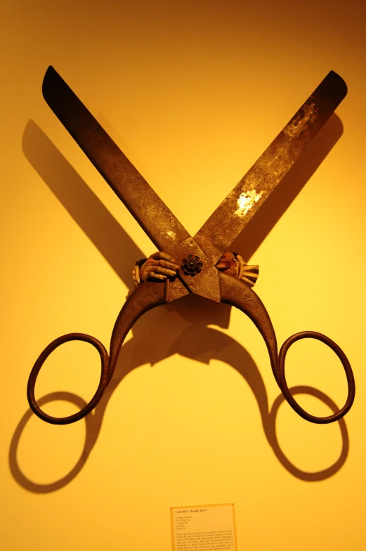 a pair of scissors on a wall
