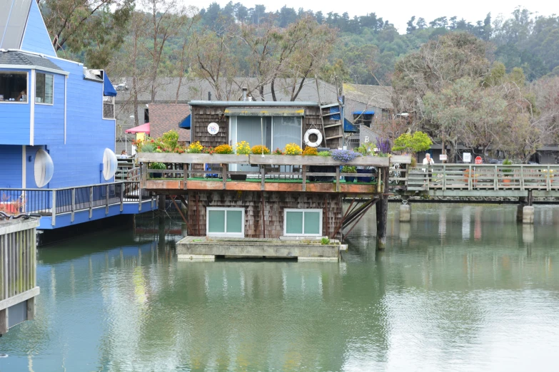 several buildings along the edge of a body of water