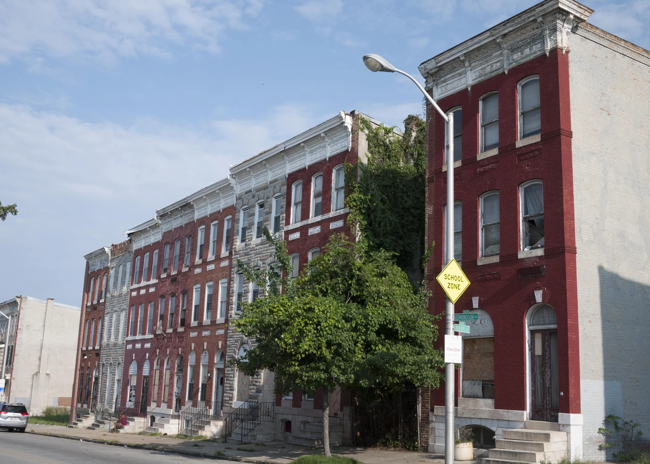 a red brick building with lots of windows on it