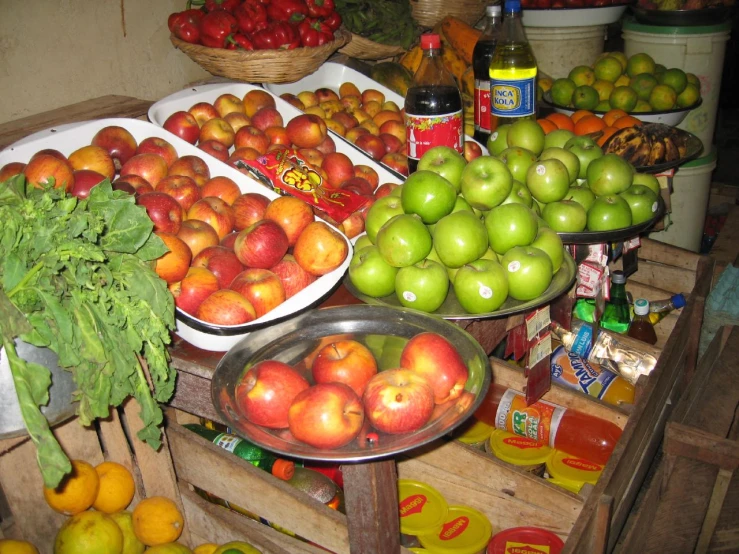 a variety of fresh produce sits on display at the market