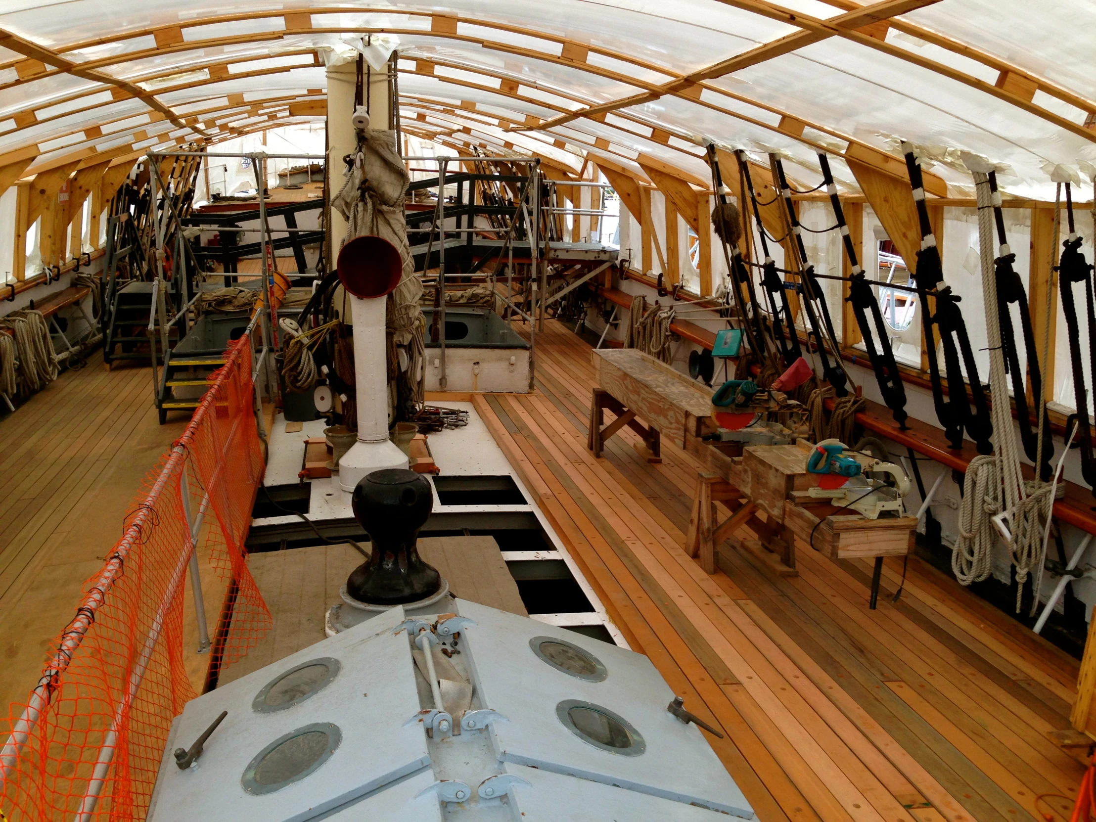 inside the interior of an airplane with wood floor