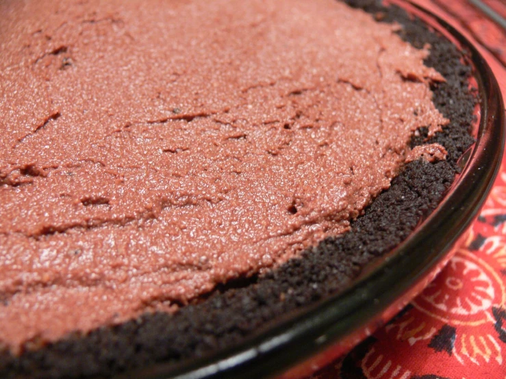 there is a close up image of a pink powdered cake