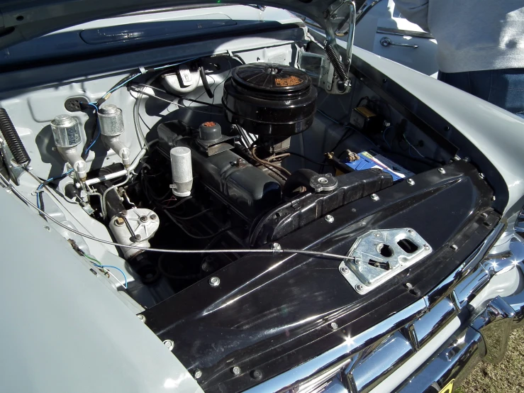 the engine compartment of a vehicle showing its various components