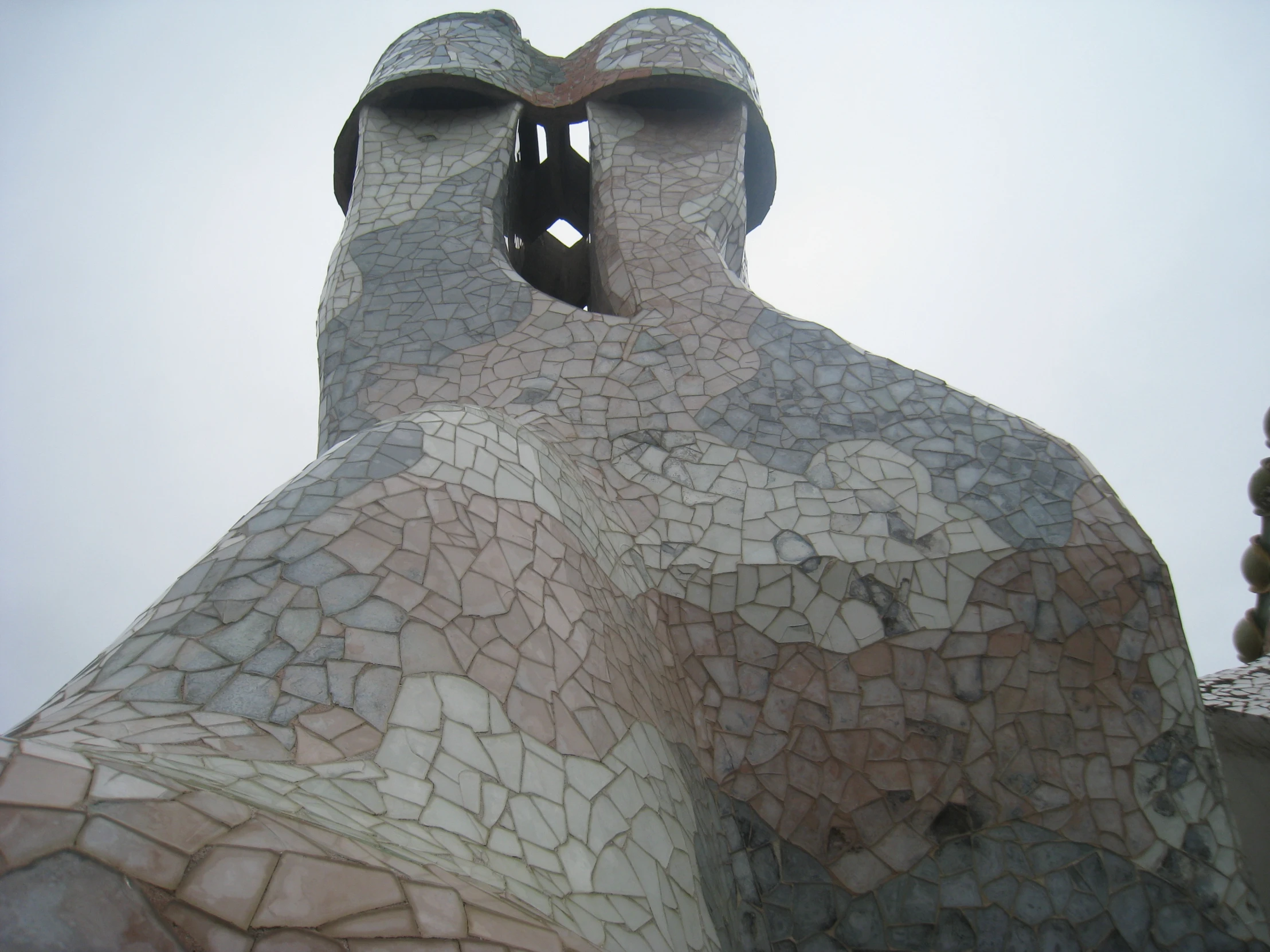 this strange looking sculpture features rocks in it