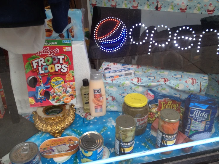 a store window with the sign'peace'lit up