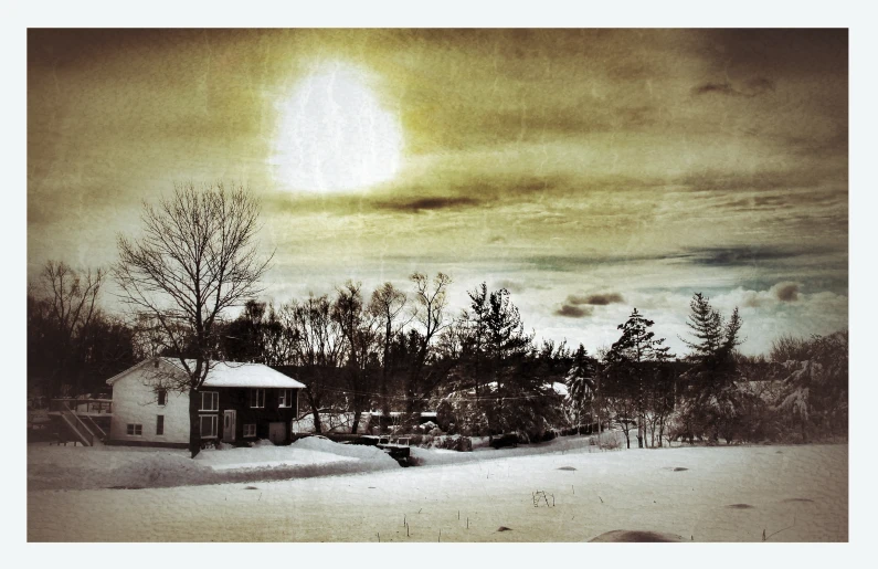 a vintage po of snow with the sun coming through the clouds