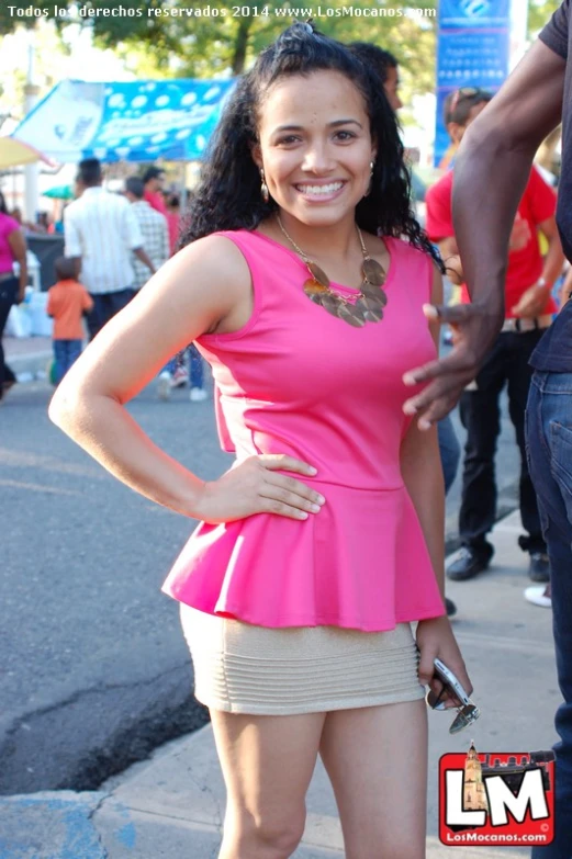 an image of a lady smiling in high heels