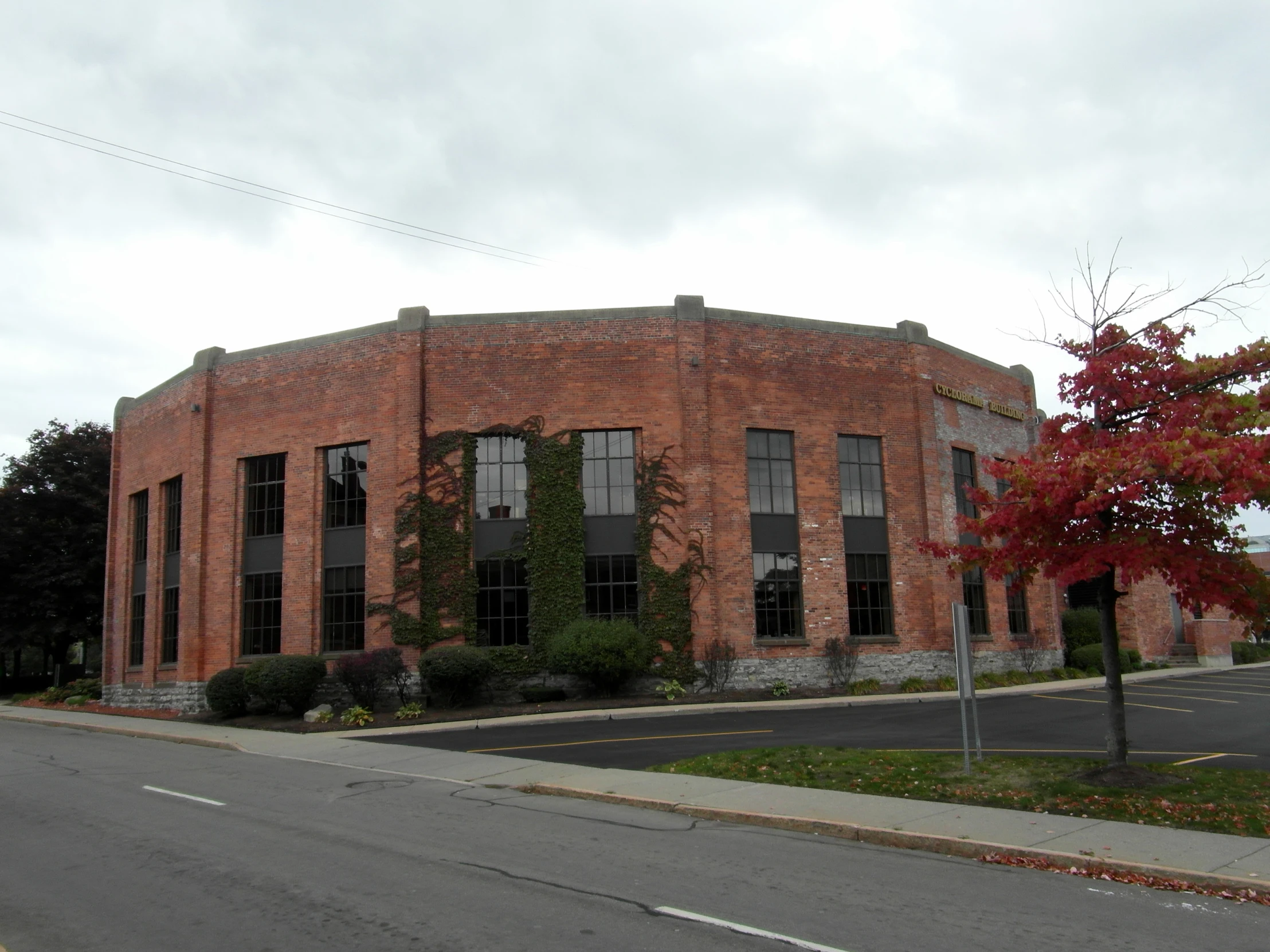 a brick building with many windows in it