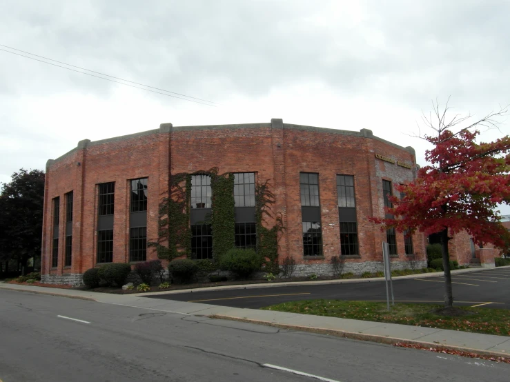 a brick building with many windows in it